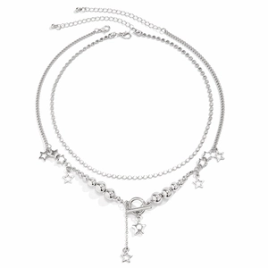 Detail of silver double-layer star pendant necklace with metallic beads and OT toggle clasp