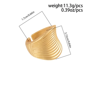 Detailed view of wide gold wavy textured ring with weight and dimension measurements