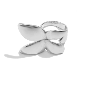 Macro shot of silver bow butterfly ring with polished metallic finish and open band design