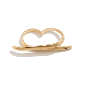 Detail shot of a minimalist gold heart-shaped double finger ring with smooth finish