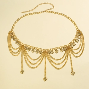 Detailed view of layered gold heart waist chain with adjustable metallic bead buckle