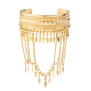 Bohemian gold metal arm cuff featuring geometric engraving and leaf fringe tassel chains