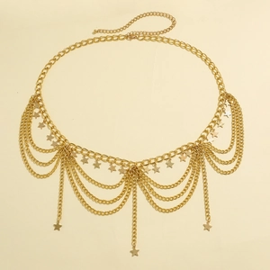 Detail of gold multilayer waist chain featuring polished metal stars and tassel fringes