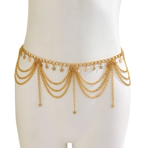 Detail view of a multi-layer gold star waist chain with elegant tassels on a model