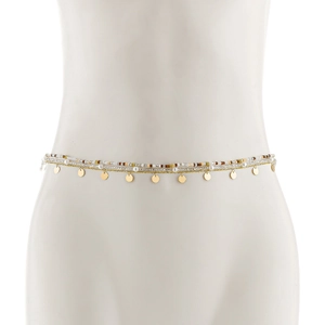 Close-up of triple-layered waist chain with seed beads and golden sequins on a model