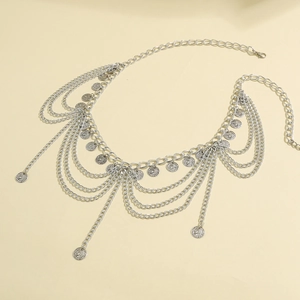 Detail of silver multi-layer waist chain with vintage coin pendants and lobster clasp