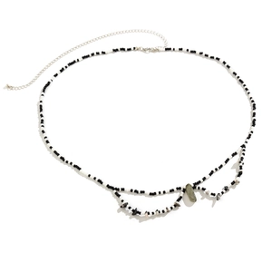 Chaîne de taille de plage avec perles noires et blanches et pendentif gemme verte