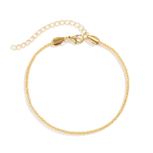 Sparkling gold layered anklet with adjustable lobster clasp on white background