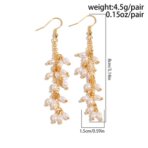 Détails des boucles d'oreilles pampilles dorées avec perles blanches et spécifications