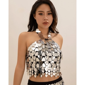 Close-up of silver sequin heart-shaped body chain top showing reflective metal details