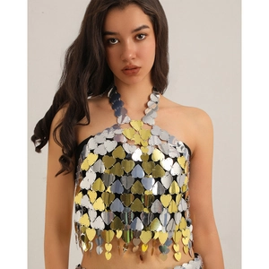 Detail shot of heart-shaped sequins and metal ring weaving on a sexy halter body chain