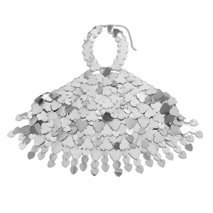 Detail of silver heart-shaped metal sequins on a halter neck body chain for beach wear