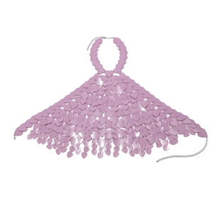 Macro detail of lavender heart sequins and metal chain links on the body chain