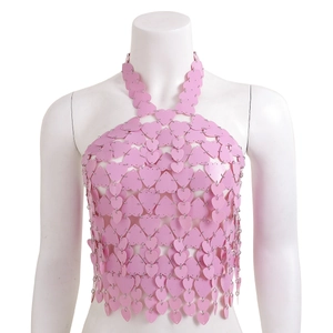 Detailed view of pink heart-shaped sequin halter top with scale-like镂空 metal link structure