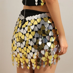 Detailed view of shimmering gold and silver heart-shaped sequins body chain party skirt