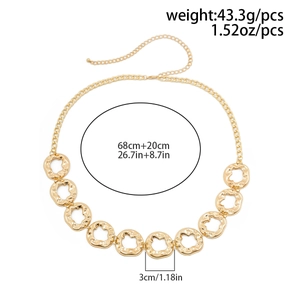 Detail of gold chain body belt with dimensions 68+20cm and textured round rings