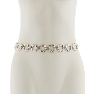 Close-up of silver metal body chain with hammered textured rings on a model