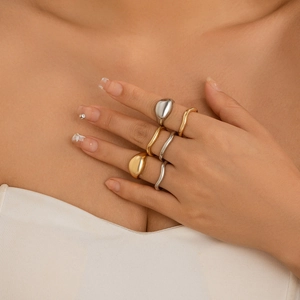 Minimalist liquid lava open ring set with irregular gold and silver polished metal finish