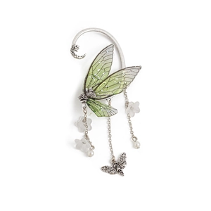 Detail of elf ear clip featuring translucent green butterfly wings and floral tassels