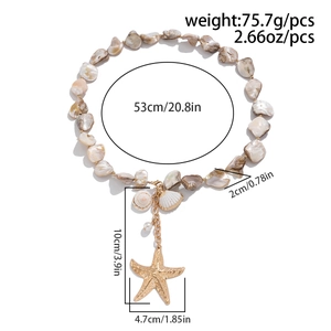 Detailed view of ocean-style shell necklace with gold starfish and shell charms