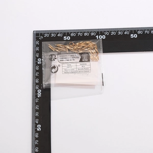 Detailed view of the gold tassel necklace packaging dimensions on a white background