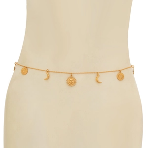 Close-up of golden body chain featuring intricate sun and moon charms for beach wear