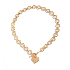 Gouden chunky schakelketting met onregelmatige hart hanger en een toggle sluiting