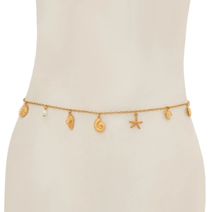 Detailed close-up of gold body chain with starfish, shells and turtle ocean charms