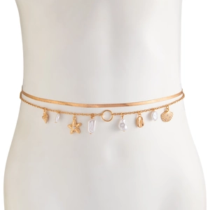 Macro detail of gold snake chain waist belt with pearl starfish and seashell charms