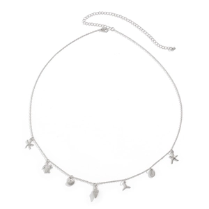 Detail of silver body chain featuring starfish, sea turtle and seashell ocean charms