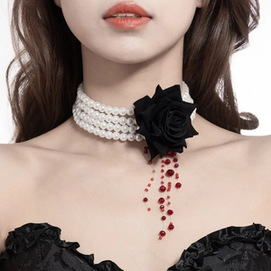Detail of gothic multilayer pearl choker with black rose and red beaded fringe