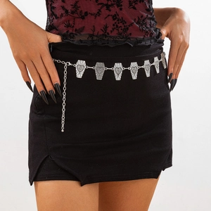 Detail of gothic body chain featuring silver coffin charms with spider web and heart patterns