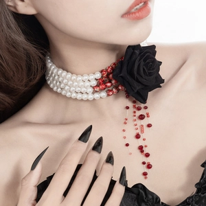 Detail of multi-layer choker necklace with black fabric rose and bloody pearl fringe