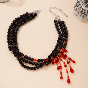 Gothic multilayer pearl necklace with red waterdrop charms and skull props