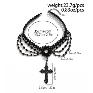 Detail of gothic multi-layer black beaded necklace featuring a cross pendant with sizing
