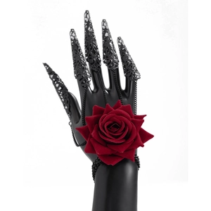Gothic rose hand chain featuring black filigree finger claws and a vibrant red fabric rose