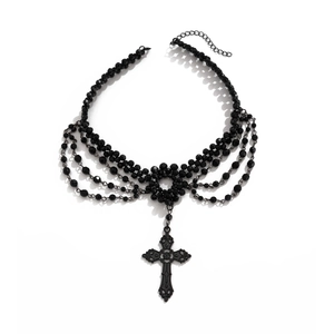 Gothic layered black beaded choker necklace featuring a vintage cross pendant on white background