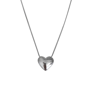 Polished silver heart pendant on a thin snake chain necklace for women