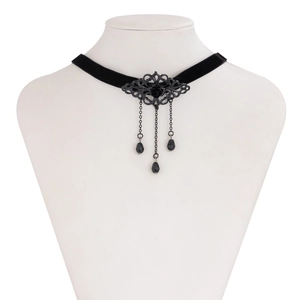 Detail of gothic black velvet choker with filigree metal and droplet bead tassels