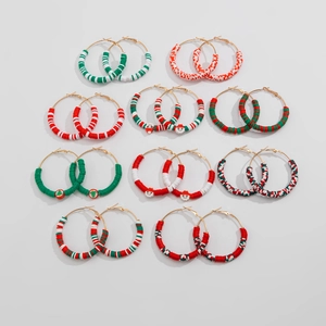 Set of 10 Christmas heishi bead hoop earrings with Santa and tree charms in red and green