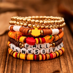Stackable Thanksgiving bracelets with turkey pendants, fall charms and colorful heishi beads