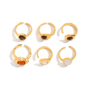 6-piece gold ring set with vintage lava metal texture and faux gemstones on white background