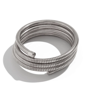 Detail view of silver multi-layer coil wrap bracelet with flexible industrial metal tube link