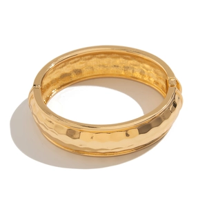 Chic hammered gold wide cuff bracelet with hinge closure and glossy polished metal finish