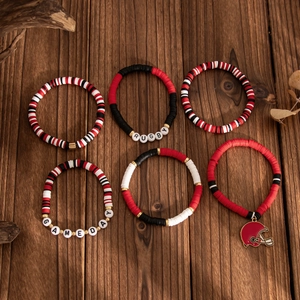 Detail of red and black rugby beads bracelets set with Gameday and helmet charms