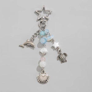 Star-shaped sea life keychain with metal dolphin turtle shell charms and blue crystal beads