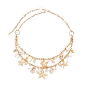 Golden multi-layer ocean body chain featuring starfish shells and pearls on white background