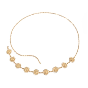 Detailed macro view of vintage gold waist chain with eight sun face pendant charms