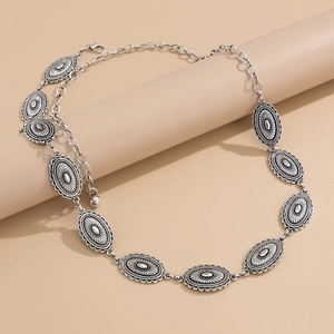 Bohemian style silver waist chain with engraved oval metal plates and adjustable lobster clasp