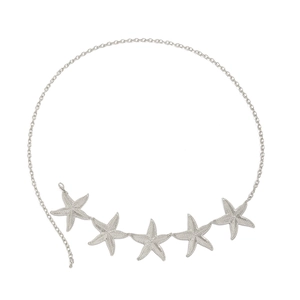 Detail of silver starfish body chain with textured metal charms and lobster clasp